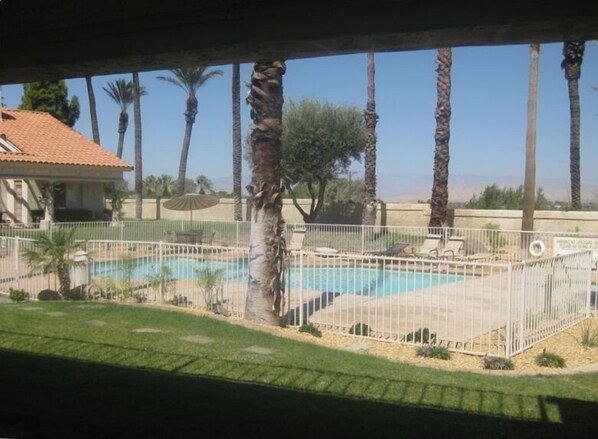 The pool  deck is recently redone and the landscaping surrounding the grounds.