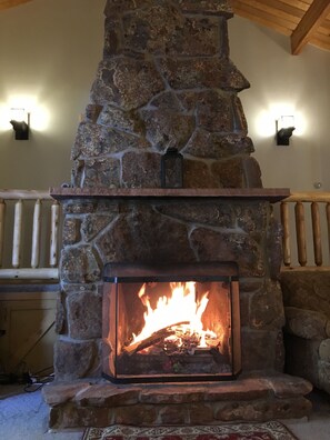 Spend time with family and friends around the wood burning fireplace.