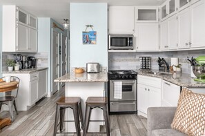 Fully equipped kitchen including KitchenAid Stand Mixer for an amazing stay! Queen sleeper sofa with memory foam topper, extra sheets & quilt in trunk!