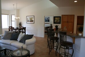 Great room, dining area, and bar