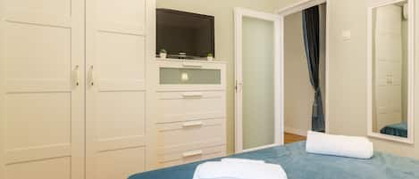 Full size wardrobe and spacious drawers. Ideal for 2 persons in long stays.     