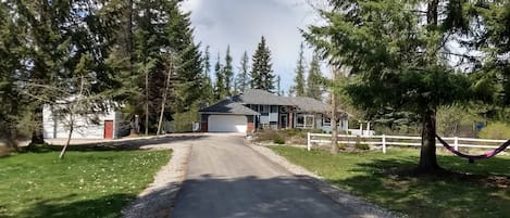 the primary paved driveway to the residence.