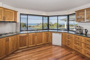Fully equipped kitchen overlooking the water