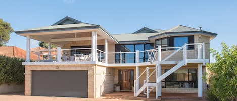 Huge balcony with table for 12 pax overlooking the water