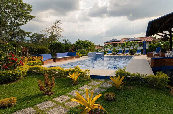 Pool area with cozy fire pit 