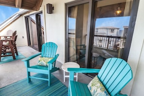 This amazing balcony features both covered and uncovered areas for your enjoyment.
