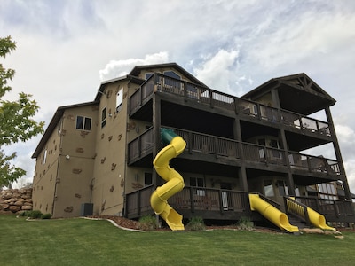 The "Big House" with.. Indoor Basketball, Trampoline and Play set, Theater Room