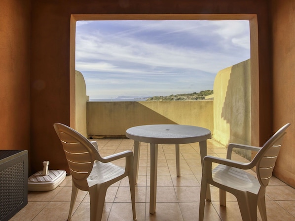 Sky, Cloud, Furniture, Property, Chair, Wood, Shade, Table, Floor