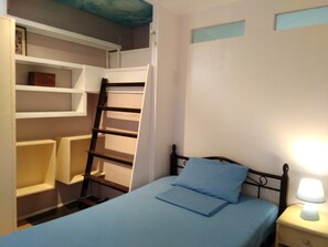 2nd floor bedroom. Good for two persons sleeping on comfy full and single size beds.
