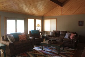 Living room with french doors that connect to the deck 