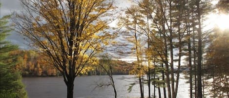 View of the lawn and river from the porch and living room.