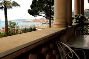 View from balcony towards Port of Menton Garavan and Old Town of Menton