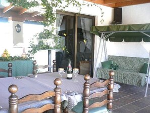 Covered Veranda and Swingy Seat