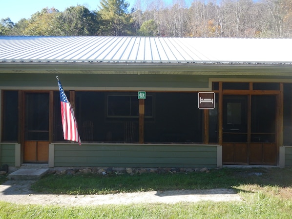 Front view of home with screened porch