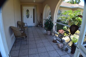 Front porch with view of pond.