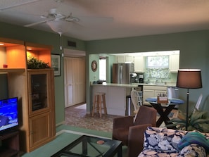 Living room, dining area and kitchen