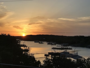 Sunset view of the lake from rooftop patio