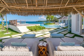Hide away in the thatched 
palapa, facing the pool, sea and secluded bay.