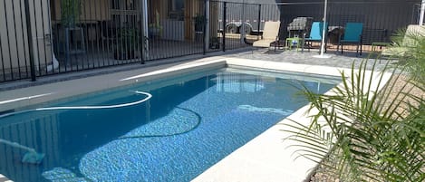 Pool patio area.
Pool is not normally heated.  Please inquire about heating fee.