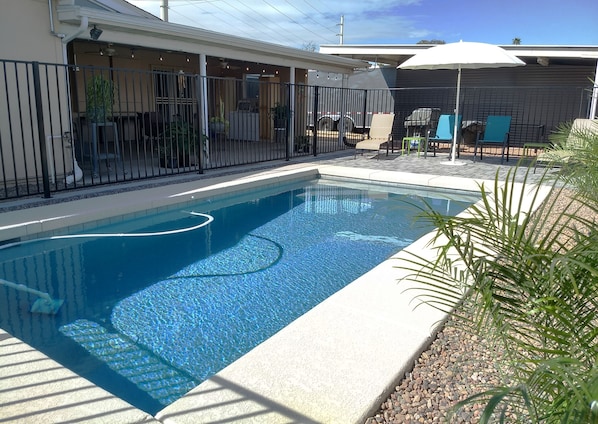 Pool patio area.
Pool is not normally heated.  Please inquire about heating fee.