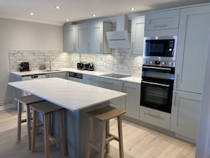 Brand new kitchen for 2022 with beautiful quartz worktops and large island