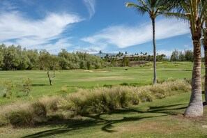 Relax on the lanai.....golf green views....