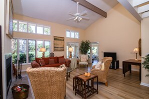 Light Floods into the Home from Floor-to-Ceiling Windows.