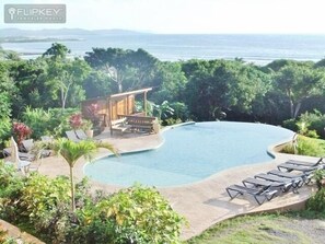 Stunning views of pool & sea from condo.
