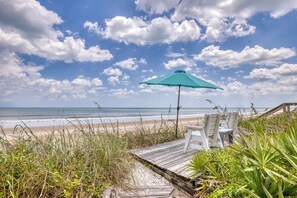 Oceanfront home with private dune deck located in serene south New Smyrna Beach.