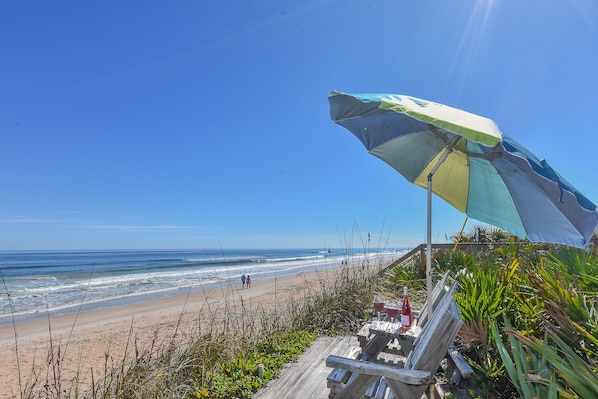 Oceanfront home with private dune deck located in serene south New Smyrna Beach.