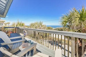 Relax on the ocean front deck and take in the gorgeous view.
