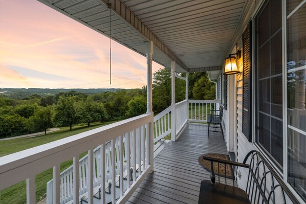 Watch beautiful sunsets from the front porch