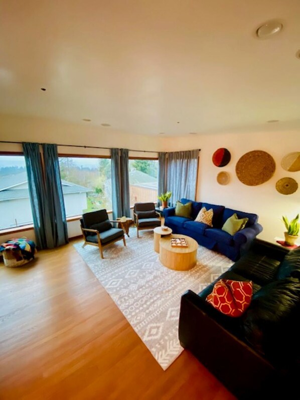 Relaxed, comfortable living room with beautiful water views. 