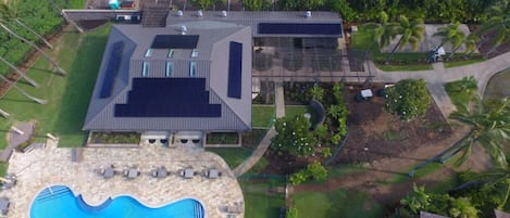 Aerial view of Pavilion and mail Pool next to beach