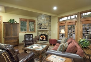 Living room with gas fireplace -perfect for relaxing after a full day of skiing!