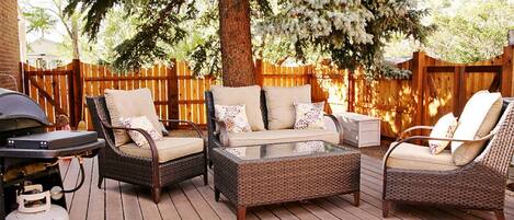 Back deck with wicker furniture
