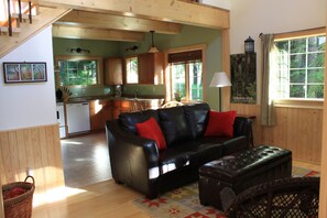 Living room has cathedral ceiling, loft above kitchen - Wedgwood Estate Cabins