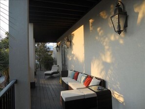 Downstairs porch--total 3000 sq feet of covered porches-multiple seating areas