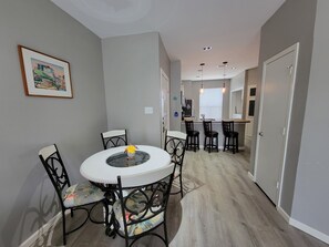 Dining table has seating for 4