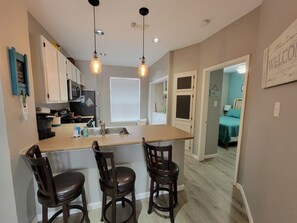 Breakfast bar has seating for 3
