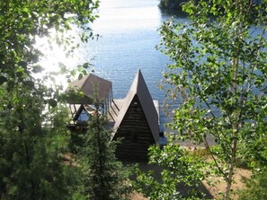 View of dock, boathouse and beach from the deck