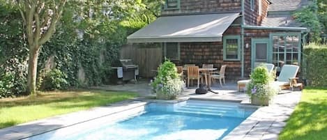 View of main house/outdoor dining area from guest cottage