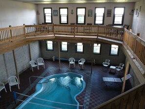 Pool upper deck with 2 dining tables/8 dining chairs.  Watch the kids from above