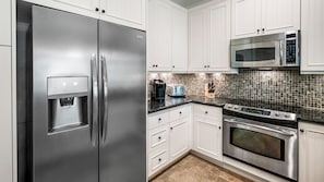 Refrigerator, Microwave, and Coffee Maker in the Kitchen