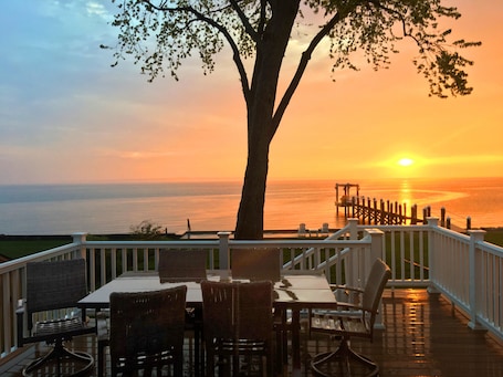 Enjoying a sunset from the back deck w/ steaks on the BBQ & cocktails in hand.