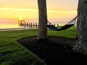 Leisure time on a hammock with a spectacular sunset on Narragansett Bay.