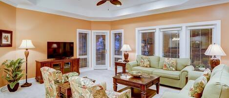 Living Room with Screened in Porch Access at 8134 Wendover Dunes