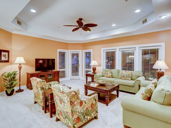 Living Room with Screened in Porch Access at 8134 Wendover Dunes