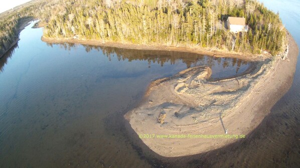 Private Beach and a very sheltered playground for kids and kayakers
