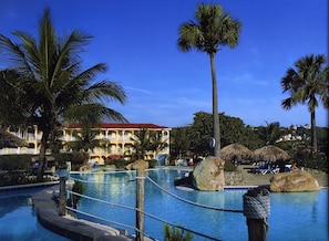 your room is just steps from the pool and the beach